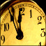 Clock about to strike midnight.
