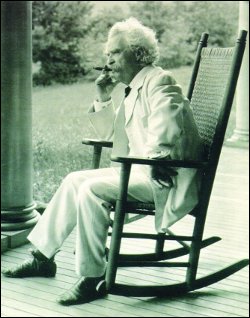 Mark Twain in a rocking chair.