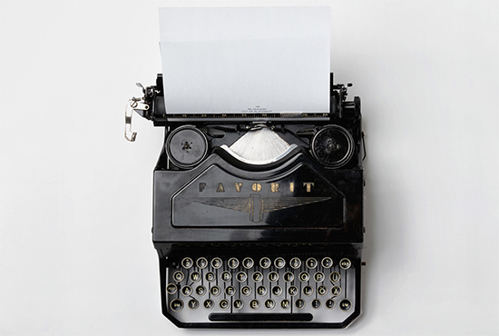 Manual typewriter on white