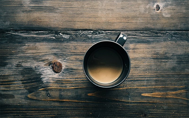 Coffee cup on a wooden table