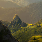 woman standing in the mountains