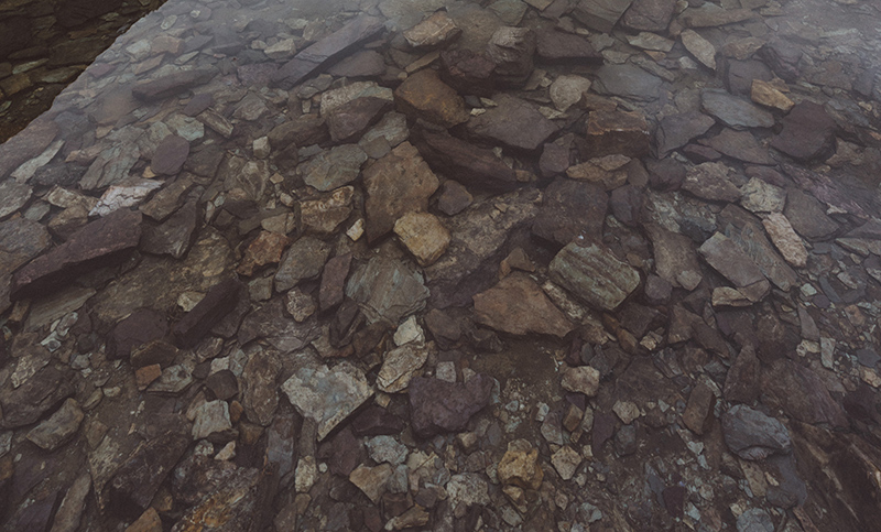 Stones in clear water.