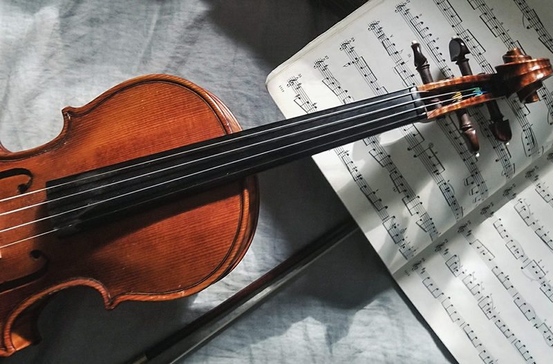 Violin and sheet music.