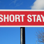 Sign reading SHORT STAY