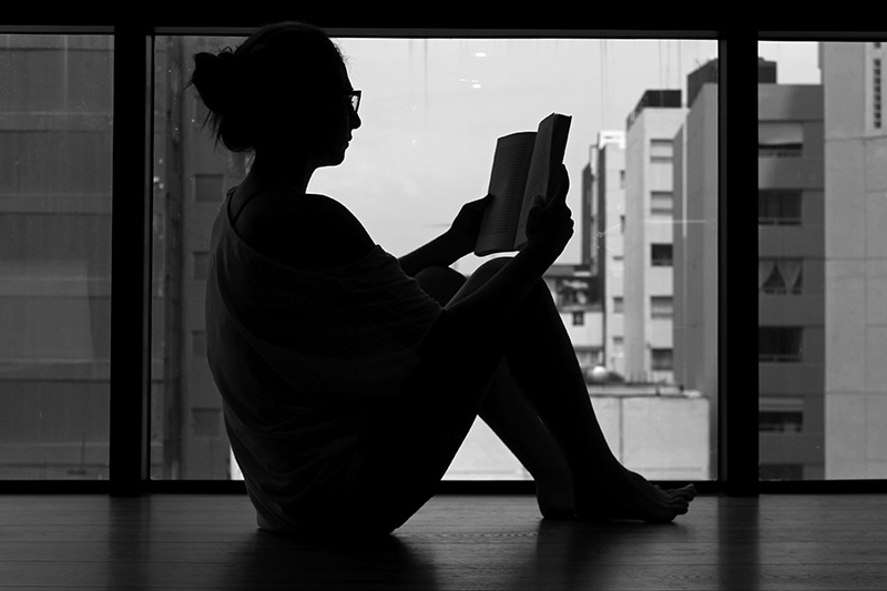 Woman reading a book.
